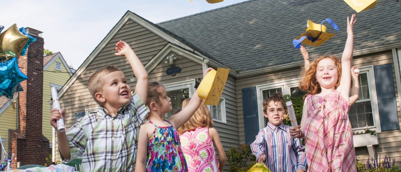 excited-children-celebrate-graduation-in-suburban-2026-01-09-09-08-52-utc